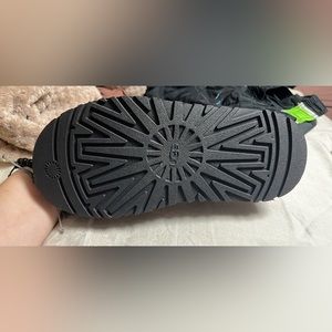 Brand new never worn womens size 7 UGG platform disco cross slides.